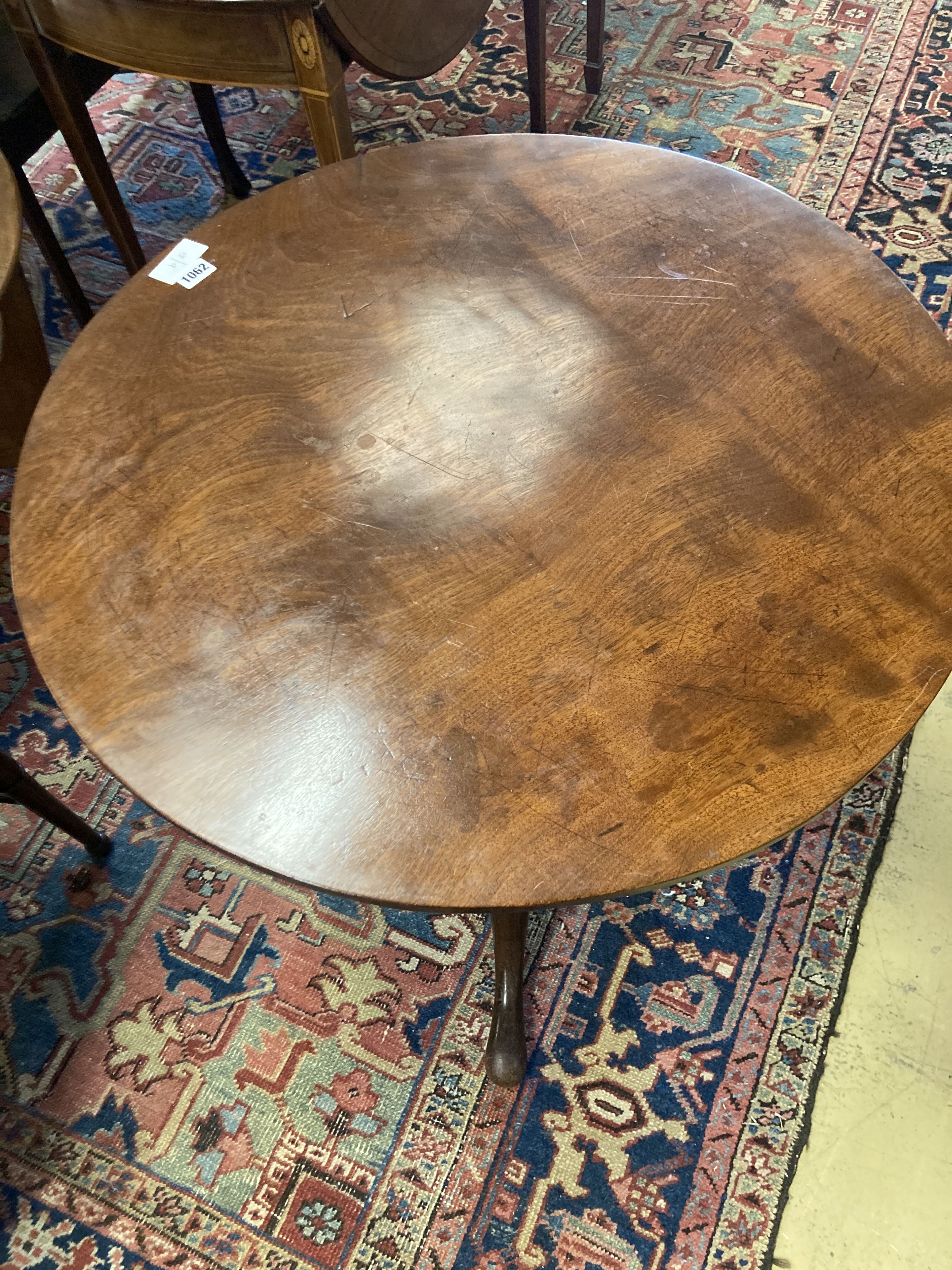 A George III and later circular tilt top tea table, diameter 70cm, height 68cm